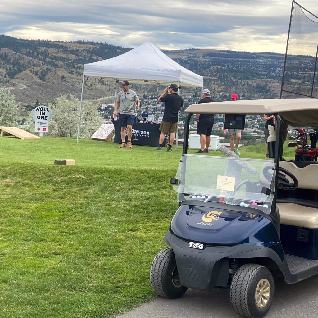 Dawson International Truck Centres booth at the Simpcw Resources Group Golf Tournament 10th hole